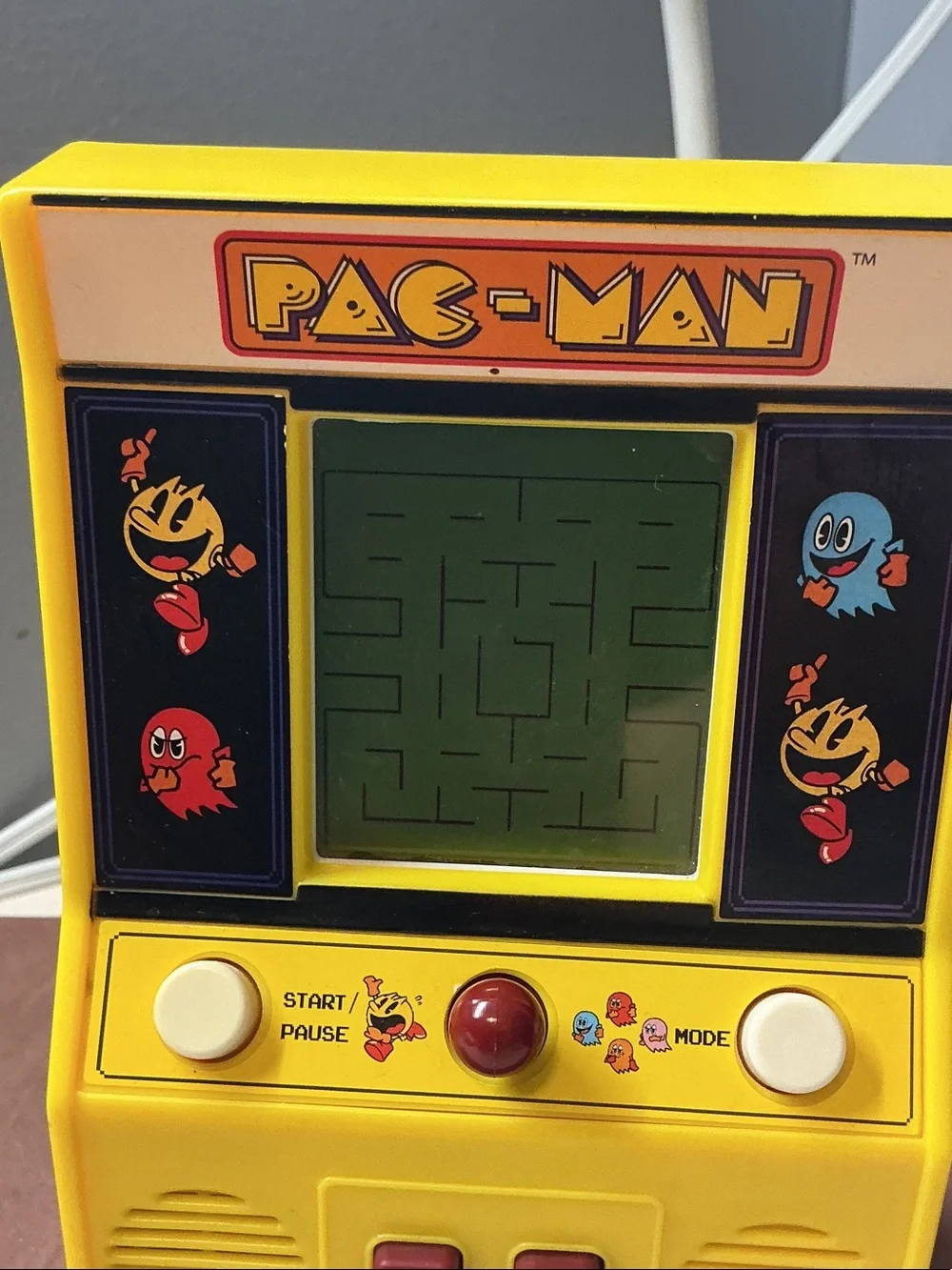 Pac-Man Portable Handheld Game Console in Yellow